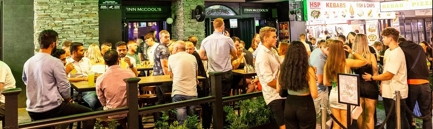 crowd in outdoor Irish Bar