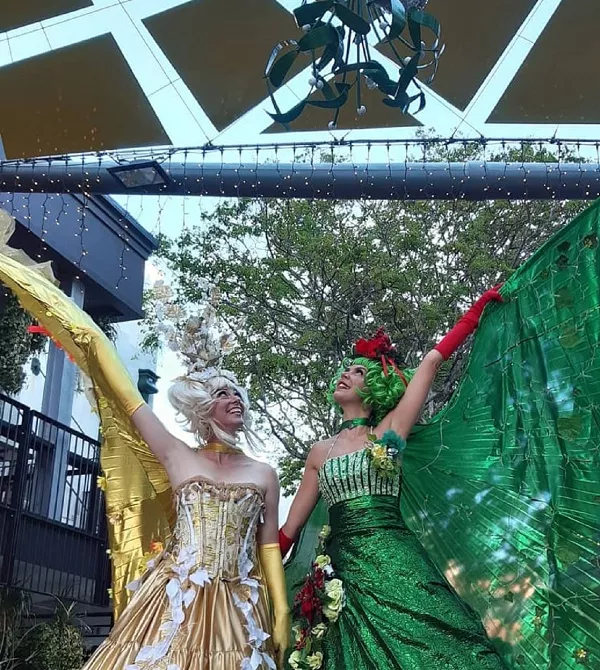 duo christmas stilt performers Raspberry Carousel