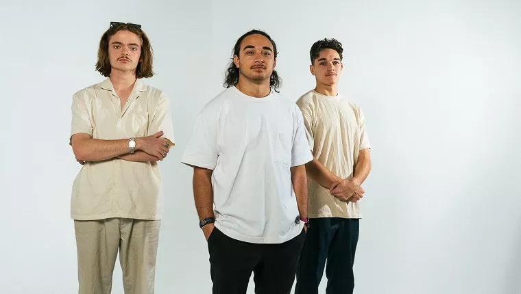 3 persons standing