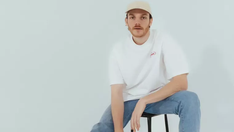 person sitting on stool