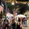 people strolling  the live music precinct